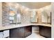 Luxurious main bathroom featuring dual sinks, sleek cabinets, and decorative mirrors at 1900 Denton Walk Ct, Marietta, GA 30062