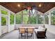 Screened-in porch with a wood ceiling and comfortable seating at 1900 Denton Walk Ct, Marietta, GA 30062