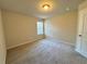 Bedroom with a window for natural light at 5576 Rockfern Drive, Lilburn, GA 30047