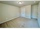 Bedroom featuring neutral walls and carpet floors at 5576 Rockfern Drive, Lilburn, GA 30047