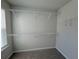 View of walk-in closet featuring multiple shelves at 5576 Rockfern Drive, Lilburn, GA 30047