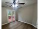 Bedroom with hardwood floors and a patio door leading to the outside at 5961 Sherwood Trce, Stonecrest, GA 30038