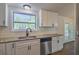 Modern kitchen featuring granite countertops, stainless steel appliances, and white subway tile at 8304 Ephesus Church Rd, Villa Rica, GA 30180
