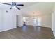 Open-concept living area with hardwood floors, natural light, and seamless flow to kitchen and dining at 8304 Ephesus Church Rd, Villa Rica, GA 30180