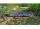 Backyard featuring a screened in porch, and mature shade trees at 8304 Ephesus Church Rd, Villa Rica, GA 30180