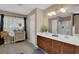Bathroom features a double vanity with plenty of counter space and a separate shower and tub at 2384 Allsborough Way, Dacula, GA 30019