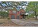 Charming two-story home with a well-manicured front yard and two-car garage at 2384 Allsborough Way, Dacula, GA 30019
