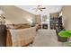 Cozy living room features a fireplace and carpet floors at 2384 Allsborough Way, Dacula, GA 30019
