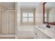 Bright bathroom with tub, shower, and vanity; a clean and functional space at 3085 Woodbridge Ln, Canton, GA 30114