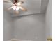 Neutral bedroom featuring a ceiling fan and light fixture providing ample light at 3085 Woodbridge Ln, Canton, GA 30114