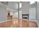 Open living room with high ceilings, fireplace and hardwood floors at 3085 Woodbridge Ln, Canton, GA 30114