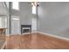 Living room featuring a fireplace, hardwood floors, and lots of natural light at 3085 Woodbridge Ln, Canton, GA 30114