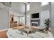 Spacious living room with fireplace, high ceilings, and lots of natural light at 3085 Woodbridge Ln, Canton, GA 30114