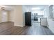 Open floor plan featuring new stainless steel appliances and granite countertops at 2038 Thomasville Se Dr, Atlanta, GA 30315
