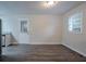 Dining area boasts stylish flooring, a door to the backyard, and plenty of natural light at 2038 Thomasville Se Dr, Atlanta, GA 30315