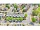 Aerial view of a well-maintained neighborhood with townhomes and mature trees at 3546 Flycatcher Way, Duluth, GA 30097