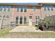 Back exterior of home featuring a patio, fenced yard and neutral colors at 3546 Flycatcher Way, Duluth, GA 30097
