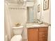 Well-lit bathroom with granite vanity, decorative accents, and towel rack at 3546 Flycatcher Way, Duluth, GA 30097