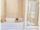 Bathroom featuring a shower, soaking tub, and decor at 3546 Flycatcher Way, Duluth, GA 30097