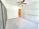 Neutral bedroom with closet and shelf in a well-lit home at 3546 Flycatcher Way, Duluth, GA 30097