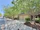 Charming townhomes with brick facade, two-car garages, and tree-lined street at 3546 Flycatcher Way, Duluth, GA 30097