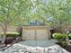 Charming townhome with brick facade, two-car garage, and manicured landscaping at 3546 Flycatcher Way, Duluth, GA 30097