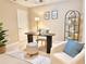 Stylish home office with modern desk, comfortable seating, and ample natural light at 3546 Flycatcher Way, Duluth, GA 30097