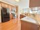 Stylish kitchen with stainless steel appliances, granite countertops, and wood cabinetry at 3546 Flycatcher Way, Duluth, GA 30097