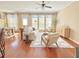 Spacious living area with hardwood floors, abundant natural light, and comfortable seating at 3546 Flycatcher Way, Duluth, GA 30097