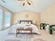 Bright main bedroom with high ceilings, sitting area, and many windows at 3546 Flycatcher Way, Duluth, GA 30097