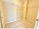 Neutral walk-in closet with carpeted floor and shelving at 3546 Flycatcher Way, Duluth, GA 30097