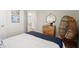 This bedroom features a unique hanging chair and stylish modern decor at 847 Pensive Run, Dacula, GA 30019