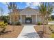 The community clubhouse features manicured landscaping and a welcoming entrance for residents at 847 Pensive Run, Dacula, GA 30019