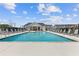 The inviting community pool area includes ample lounge seating for residents at 847 Pensive Run, Dacula, GA 30019