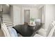 Dining area with staircase featuring neutral colors and decor at 847 Pensive Run, Dacula, GA 30019