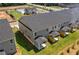 New construction townhomes feature backyard patios and a community pool for outdoor fun at 847 Pensive Run, Dacula, GA 30019