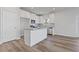 Bright kitchen featuring white cabinets and stainless steel appliances at 847 Pensive Run, Dacula, GA 30019