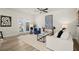 Inviting living room with stylish furniture, decor, and a neutral color palette at 847 Pensive Run, Dacula, GA 30019