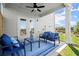 Relax on this covered patio with comfortable seating and a great view of the outdoors at 847 Pensive Run, Dacula, GA 30019