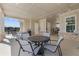 A pool-side patio has seating with an outdoor grill, perfect for community entertaining at 847 Pensive Run, Dacula, GA 30019