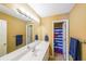 Full bathroom with a combination shower and tub featuring light fixtures and blue accents at 31 Vine Creek Ln, Acworth, GA 30101