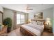 Cozy bedroom suite bathed in light with neutral colors, comfortable bed, and matching nightstands at 31 Vine Creek Ln, Acworth, GA 30101