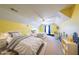 Serene bedroom featuring twin beds, city artwork, and cheerful lighting to create an airy space at 31 Vine Creek Ln, Acworth, GA 30101