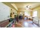 Versatile bonus room, ideal for a hobby space or office, features ample natural light and decor at 31 Vine Creek Ln, Acworth, GA 30101