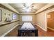 Enjoy a lively game room featuring an air hockey table and nautical decor at 31 Vine Creek Ln, Acworth, GA 30101