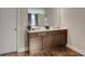 Bathroom featuring double vanity with marble countertop and framed mirror at 336 Elaina Cir, Locust Grove, GA 30248
