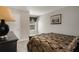 Bedroom with a black sleigh bed, matching dresser, carpeted flooring and natural light at 336 Elaina Cir, Locust Grove, GA 30248