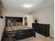 Bedroom with a black sleigh bed, matching dresser, and carpeted flooring at 336 Elaina Cir, Locust Grove, GA 30248