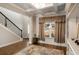Elegant room with decorative rug, and coffered ceilings, seamlessly blending style and comfort at 336 Elaina Cir, Locust Grove, GA 30248
