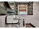 Bathroom with patterned wallpaper, white subway tile and modern faucet at 703 Cumberland Ne Cir, Atlanta, GA 30306